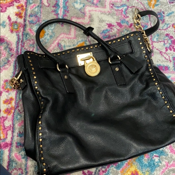 Michael Kors Handbags - Michael Khors Black leather Gold studded bag